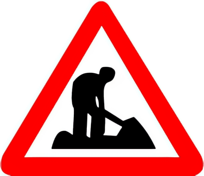 Men at work traffic sign colored